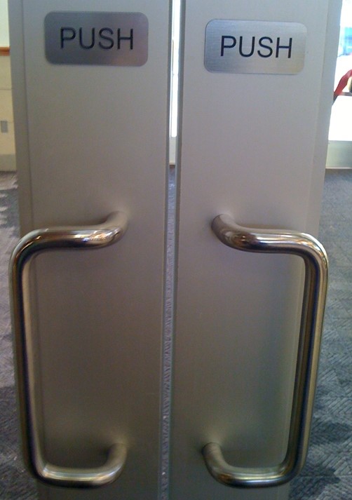 Doors with two push plates on them